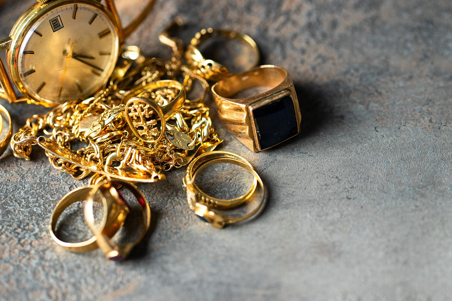 Assorted gold jewelry, watches, and valuables we accept